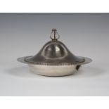 A Guild of Handicrafts electroplated copper muffin dish with warmer base, circa 1900, designed by