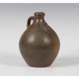 A Svend Bayer studio pottery stoneware flagon with 'maze' seal to the shoulders, impressed seal mark