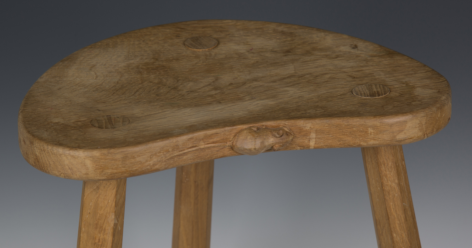 A Robert 'Mouseman' Thompson oak stool, the kidney shaped seat panel with typical carved mouse - Image 2 of 2