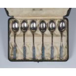 A set of six Liberty & Co silver and enamelled coffee spoons, each handle engraved and enamelled