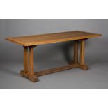 A George VI Arts and Crafts style oak rectangular dining table, in the manner of Heals, possibly Air