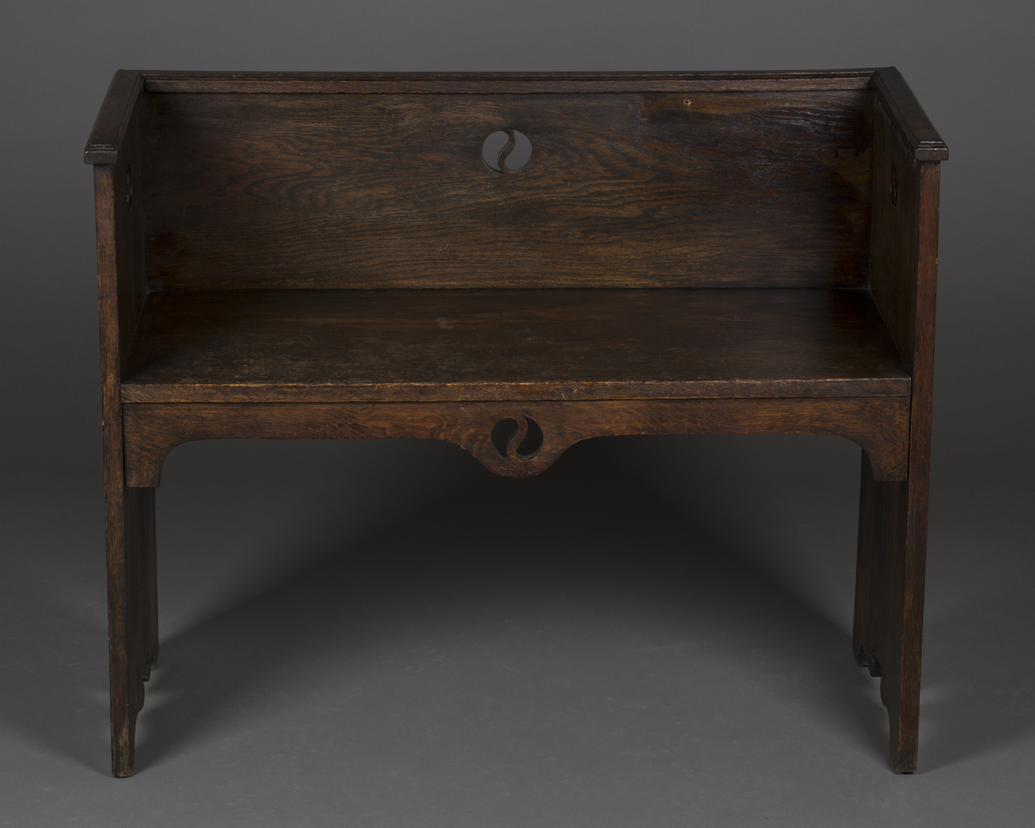 An early 20th century Arts and Crafts style stained oak hall bench, possibly by Liberty & Co, the - Image 3 of 4