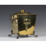 An Edwardian Arts and Crafts brass and wrought iron mounted coal box and cover, the lid and tapering