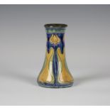 A Della Robbia pottery vase, circa 1895, decorated by John Fogo, monogrammed, the tapered