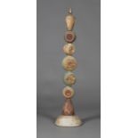 A Bernard Rooke studio pottery Totem standard lamp, formed from seven relief detailed abstract