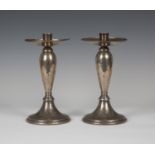 A pair of Liberty & Co 'Tudric' plated pewter candlesticks, model number '01223', the overall
