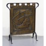 An Arts and Crafts patinated copper and wrought iron firescreen, finely worked with a galleon with