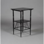 A late Victorian Aesthetic period ebonized occasional table, in the manner of E.W. Godwin, the