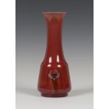 A Moorcroft Flamminian pattern vase, circa 1910, of the type retailed by Liberty, the squat red