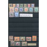 A collection of fifteen albums and stock books containing world stamps, including Great Britain