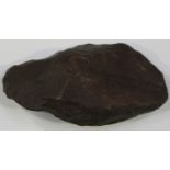A rare South African chipped stone hand axe, inscribed 'Transvaal', length 9.5cm.Buyer’s Premium