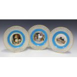A set of three Minton porcelain cabinet plates, late 19th century, painted after Edwin Landseer by