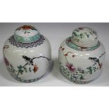 A near pair of Chinese famille rose porcelain ginger jars and covers, early 20th century, each