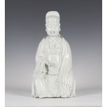 A Chinese blanc-de-Chine porcelain figure of Caishen, Kangxi style but late Qing dynasty, the god of