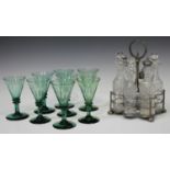 A set of eight green glass wines, late 19th/early 20th century, with faceted decoration, height 13.