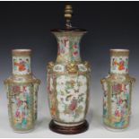 A Chinese Canton famille rose porcelain vase, mid to late 19th century, the shouldered body and