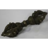 A Tibetan bronze vajra, probably late 19th/early 20th century, each end formed as a crown, centred
