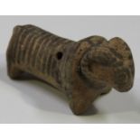 An Indus Valley Civilisation painted terracotta figure of a ram, circa 2400-2600 BC, modelled in a