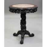 A Chinese hardwood wine table, late Qing dynasty, the circular top inset with a rouge marble panel