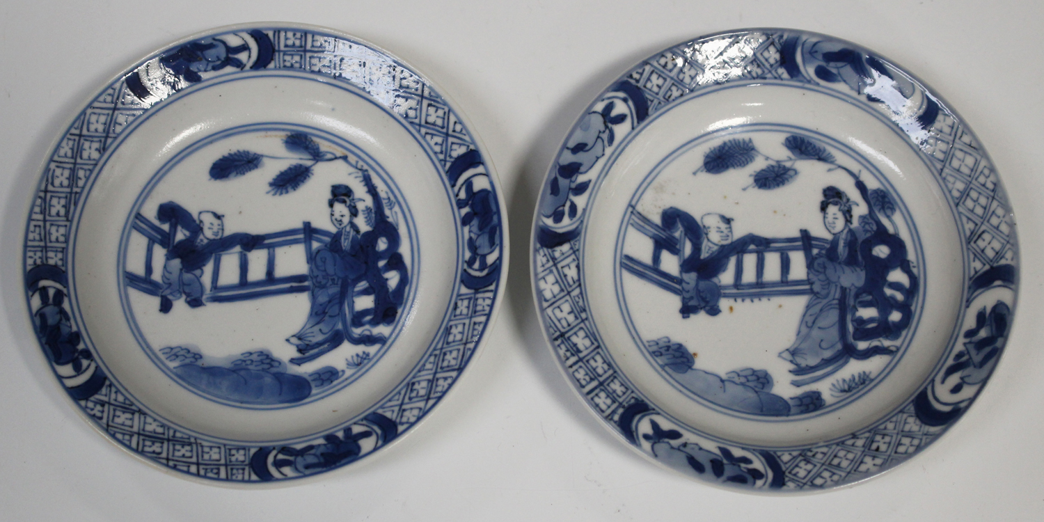 A pair of Chinese blue and white porcelain small circular dishes, mark of Chenghua but Kangxi