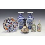 A pair of Chinese blue and white porcelain vases, mark of Kangxi but late 19th century, each
