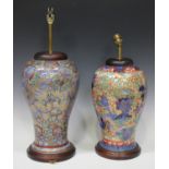 Two Chinese 'clobbered' blue and white porcelain vases, Kangxi period and later, one painted with