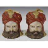 Two W. Schiller & Sons pottery tobacco jars and covers, late 19th century, each modelled as the head