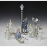 Seven Lladro porcelain figures, comprising Lamplighter, No. 5205, Golfer, No. 4824, Fairy Godmother,