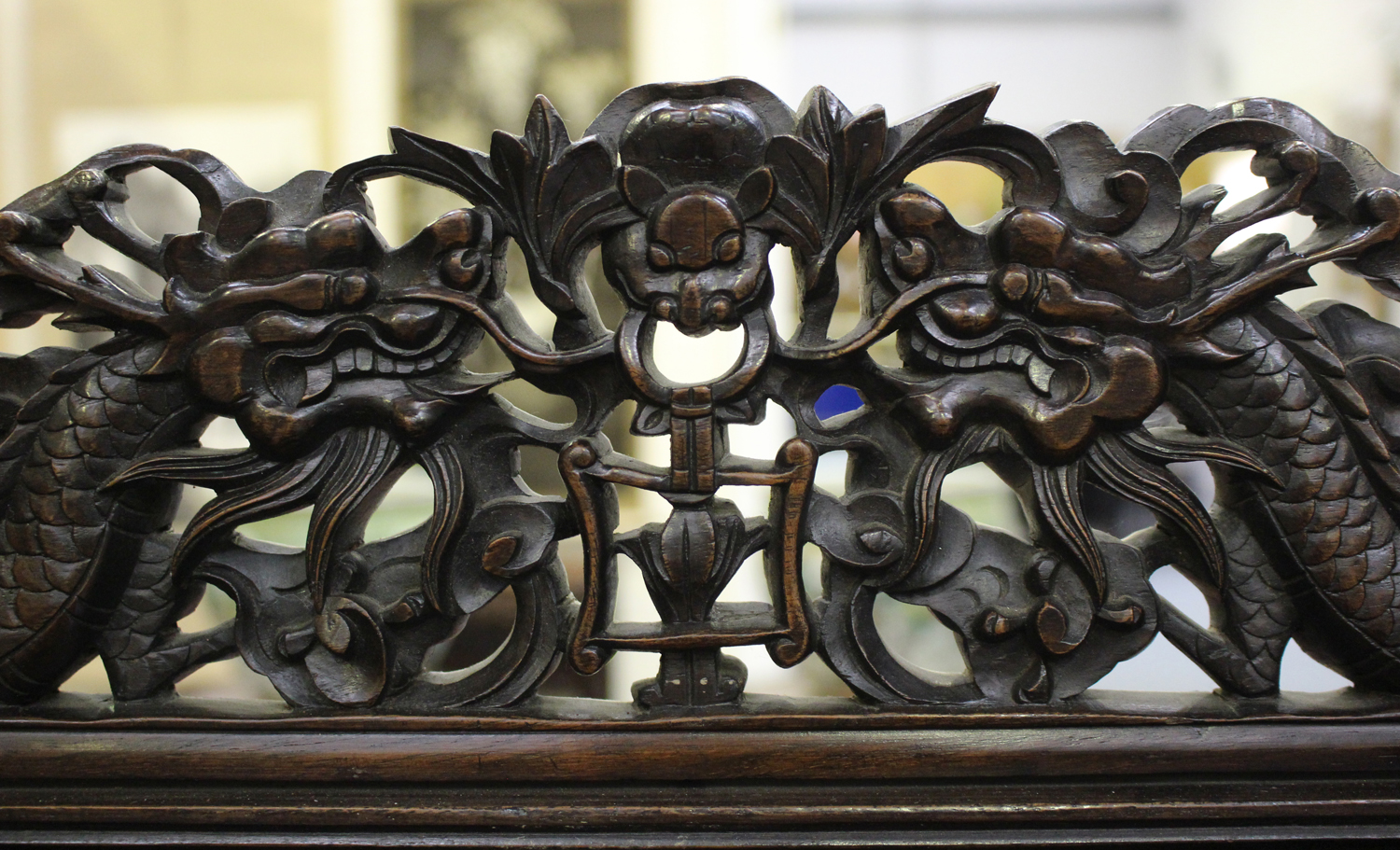 A Chinese hardwood writing desk with carved blossoming prunus decoration, late 19th century, the - Image 4 of 14