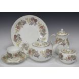 A Wedgwood bone china 'Lichfield' pattern part tea service, comprising two cake plates, teapot and