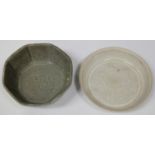 A Chinese Dingyao small circular dish, probably Song dynasty, of shallow circular form, the centre