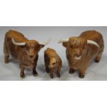 Three Beswick models of cattle, comprising a Highland Bull, No. 2008 (repaired horn), a Highland