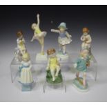 A set of seven Royal Worcester bone china Girl figures from the Days of the Week series, modelled by