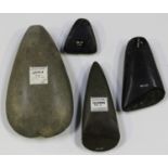 A Solomon Islands polished stone axe, bearing 'F.S. Clark Collection' label, detailed 'Solomons',