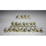 Twenty-one Royal Worcester porcelain thimbles, various dates but each with black printed factory