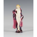 A Royal Doulton porcelain figure 'The Bather', HN773, green printed, black painted and impressed