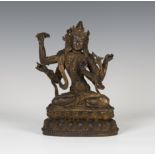 A Sino-Tibetan gilt bronze figure of the four-armed Manjushri, mark of Xuande but probably late Qing