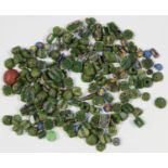 A collection of Roman green and coloured glass beads.Buyer’s Premium 29.4% (including VAT @ 20%)