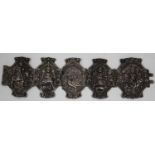 An Indian silver five-link bracelet, 19th century, each panelled link finely worked in relief with