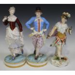 A pair of Continental porcelain figures of ice skaters, late 19th century, the man and woman wearing