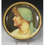 A large Doulton Lambeth decorated Pinder, Bourne & Co faience pottery circular plaque, late 19th
