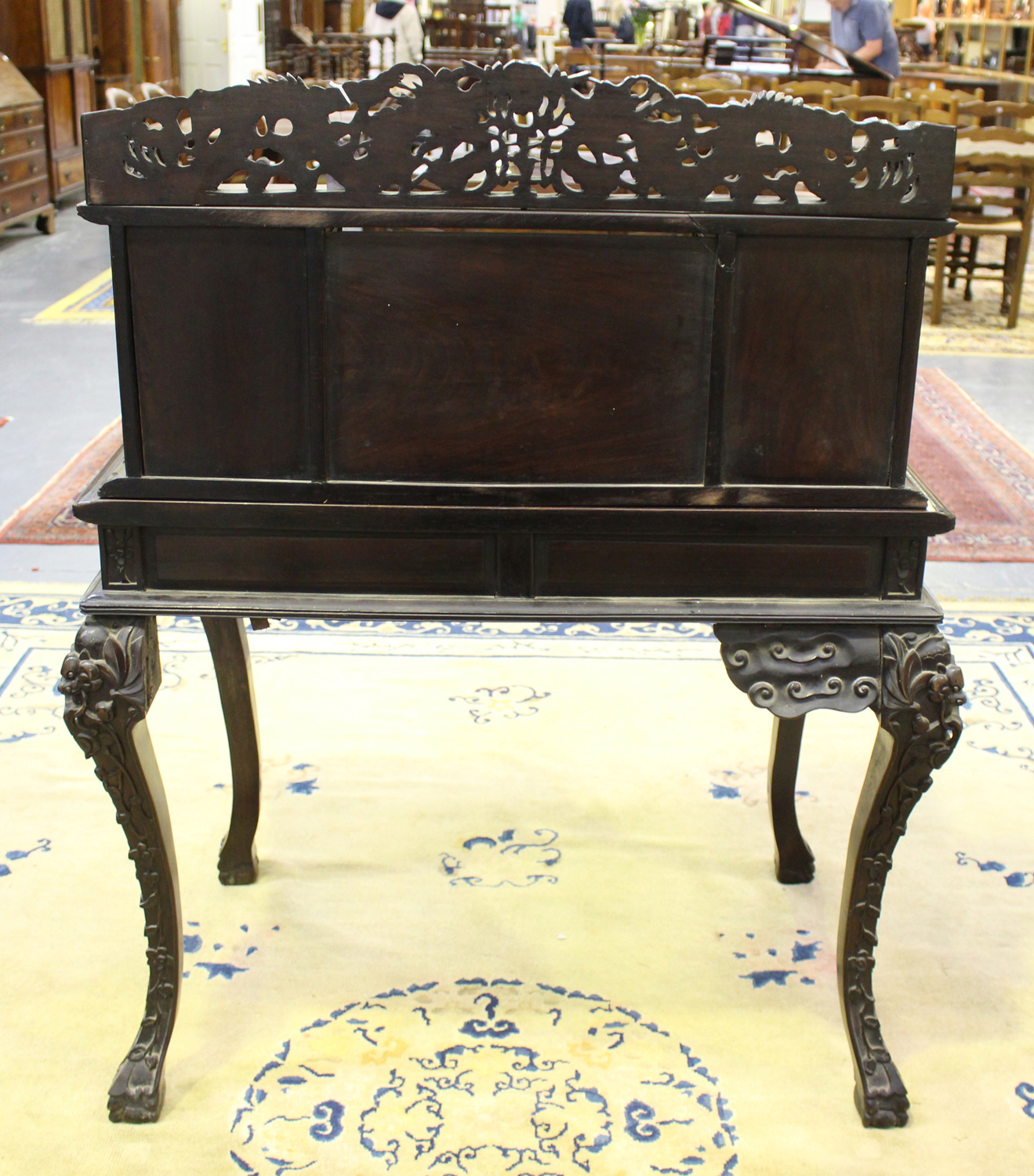 A Chinese hardwood writing desk with carved blossoming prunus decoration, late 19th century, the - Image 6 of 14