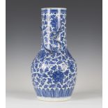 A Chinese blue and white porcelain vase, late 19th century, the shouldered body and cylindrical neck