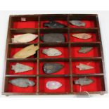 A group of American flint arrowheads and spear points, the majority detailed in ink with Hugh