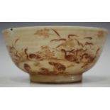 A Chinese porcelain bowl, mark of Qianlong but later, the exterior painted in shades of iron red