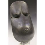A Makonde carved wooden pregnancy body mask, Mozambique, modelled to imitate the torso of a pregnant