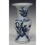 A Chinese blue and white porcelain vase, the baluster body and flared neck painted with a figure,