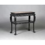 A Chinese hardwood two-tier centre table, late Qing dynasty, the rectangular top inset with a