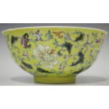 A Chinese famille rose enamelled yellow ground porcelain bowl, mark of Daoguang but later, of