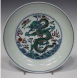 A Chinese doucai porcelain saucer dish, mark of Yongzheng but modern, of shallow circular form,